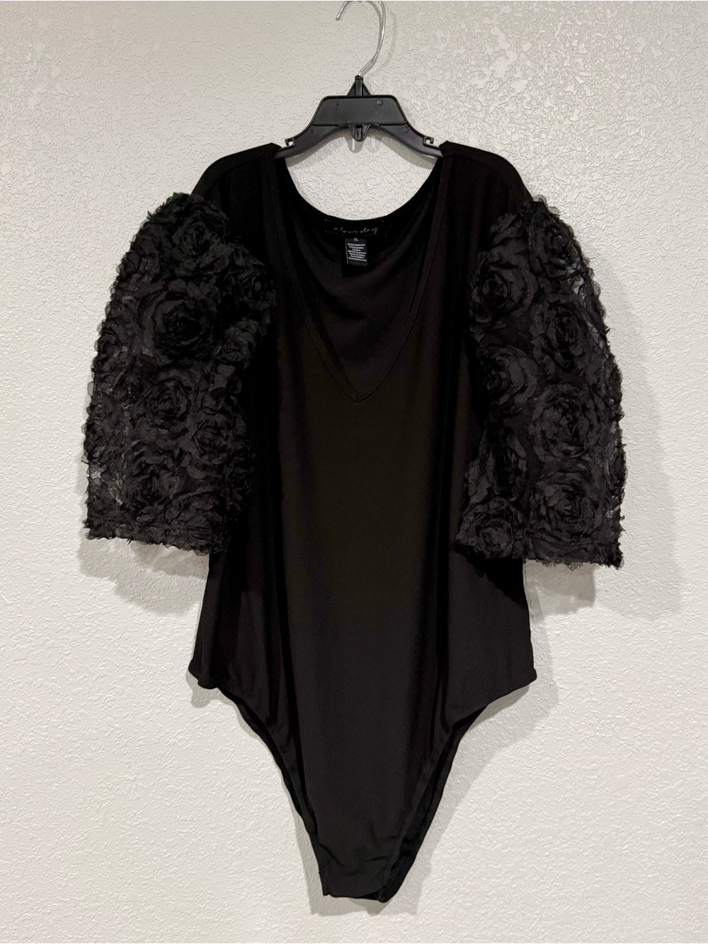 Women's Black V-Neck Bodysuit with Rosette Lace Sleeves